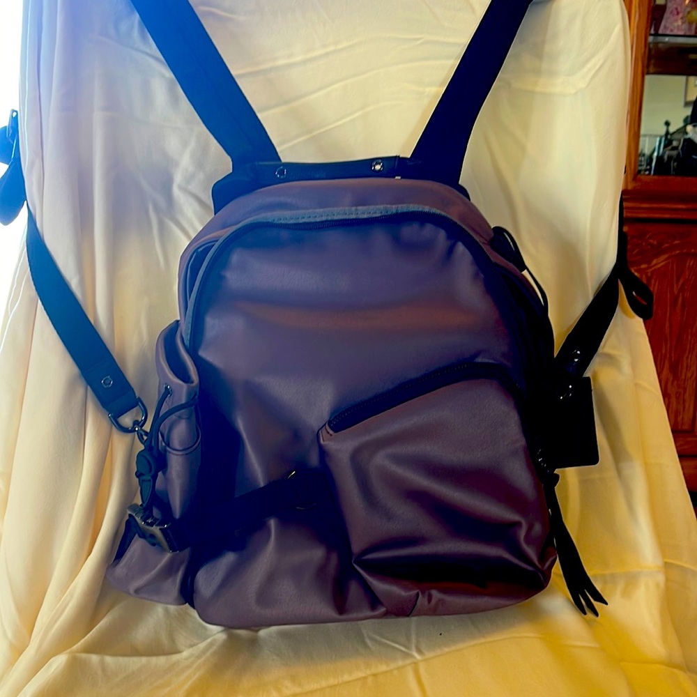 Unique Nylon smaller Tumi backpack with water bottle pocket